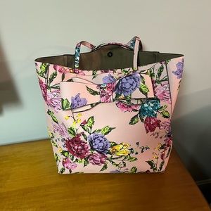 Betsey Johnson tote with multiple pockets.
